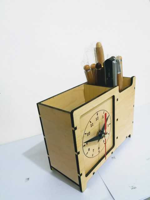 Wooden watch with pen holder
