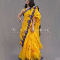 Yellow Colored Monipuri Saree with Blue par